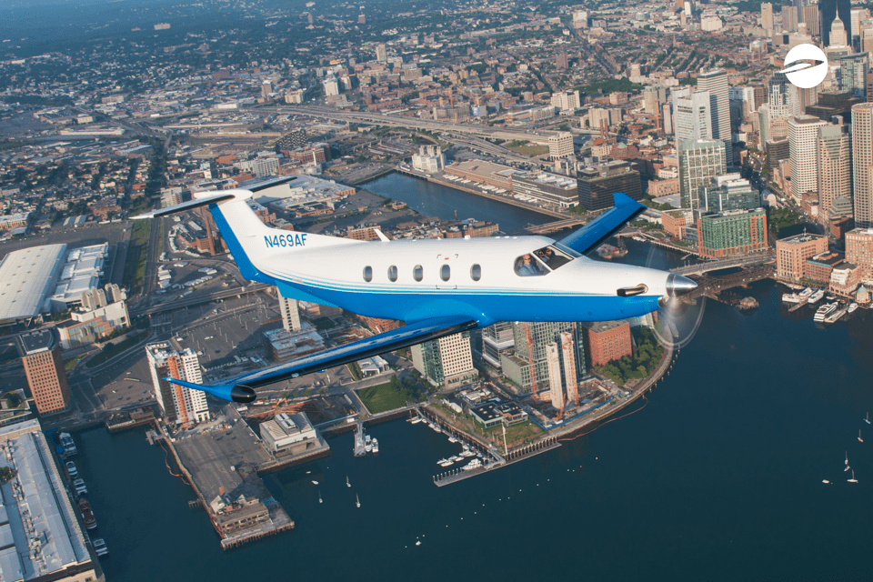Pilatus PC-12 flies over Boston, MA